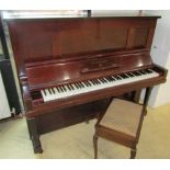 Steinway (c1921) A Vertegrand upright piano in a mahogany case; together with a stool.