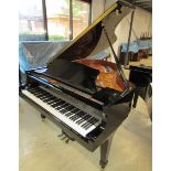 Kawai (c2009) A 5ft 10in Model RX2 grand piano in a bright ebonised case on square tapered legs.