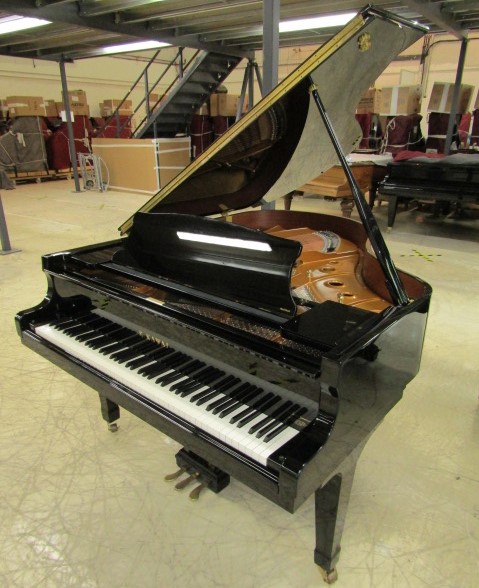 Kawai (c2009) A 6ft 1in Model RX3 grand piano in a bright ebonised case on square tapered legs.