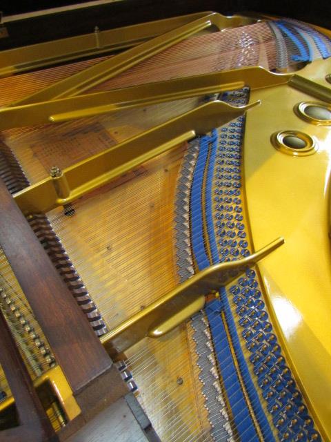 Blüthner (c1919) A 6ft 3in grand piano in a rosewood case on square tapered legs. - Image 3 of 3