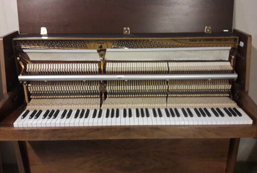 Welmar (c1994) An upright piano in a modern style mahogany case. AMENDMENT Is in a walnut case. - Image 3 of 4