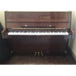 Waldstein (c1970’s) An upright piano in a mahogany case.