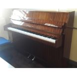 Brinsmead (c1970’s) An upright piano in a mahogany case.