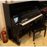 Yamaha (c2003) A Model U3S upright piano in a bright ebonised case;