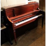 Steinway (c2003) A Model 45/10 upright piano in a satin cherry wood case.