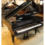 Diapason by Kawai A 6ft Model 183C grand piano in a bright ebonised case on square tapered legs.