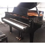 Yamaha (c2006) A 5ft 8in Model C2 grand piano in a bright ebonised case on square tapered legs.