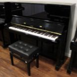 Boston (c2002) A Model UP132E upright piano in a bright ebonised case;