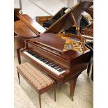 Blüthner (c1934) A 5ft 1in grand piano in a mahogany case on square tapered legs;