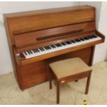 Knight (c1969) An upright piano in a modern style teak case; together with a matching stool.