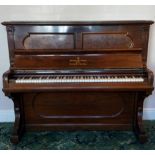 Steinway (c1893) An upright piano in a rosewood case.