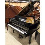 Kawai (c1999) A 5ft 10in Model RX2 grand piano in a bright ebonised case on square tapered legs.