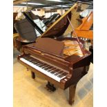 Yamaha (c2003) A 5ft 8in Model C2 grand piano in a bright ebonised case on square tapered legs.