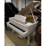 Yamaha (c1965) A 5ft 7in Model G2 grand piano in a bright white case on square tapered legs.