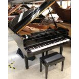 Yamaha (c2010) A 6ft 6in Model C5L grand piano in a bright ebonised case on square tapered legs;