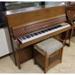 Welmar (c1984) A compact upright piano in a satin mahogany case; together with a stool.