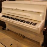 Steinbach A recent Model UP108D1 upright piano in a bright white case.