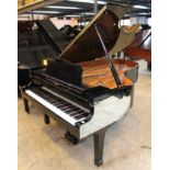 Yamaha (c2005) A 6ft 7in Model C5 grand piano in a bright ebonised case on square tapered legs.