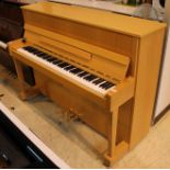 Kawai (c2003) A 114cm Model K-18B upright piano in a light wood case.