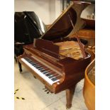 Kawai (c1978) A 5ft 10in Model KG-2 grand piano in a bright ebonised case on square tapered legs.