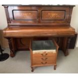 Steinway (c1902) An upright piano in a rosewood and inlaid case;