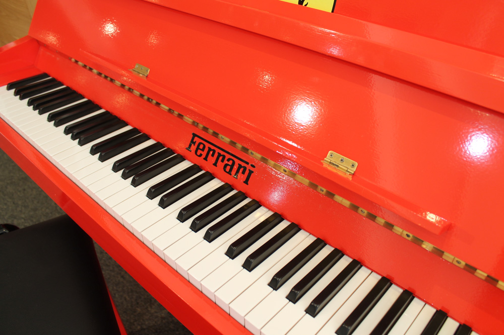 Upright Piano A recent upright piano in a modern style case decorated in the red Ferrari livery. - Image 2 of 4