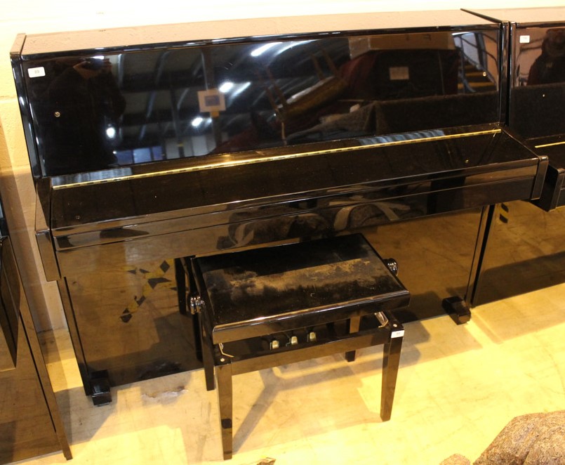 Weber (c2006) A 110cm upright piano in a bright ebonised case; together with a matching stool.