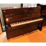 Bechstein (c1981) A 112cm Model 12N upright piano in a mahogany case; together with a stool.