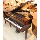 Steck (c1930’s) A 4ft 6in grand piano in a mahogany case on square tapered legs;