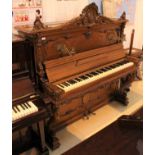 Berdux (c1892) No 4815 An upright piano in a carved mahogany Rococo case decorated with shell and