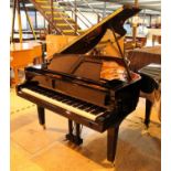 Yamaha (c2009) A 5ft 6in Model GC2 grand piano in a bright ebonised case on square tapered legs;