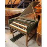 Double Manual Harpsichord A Double manual harpsichord in a green painted case on a trestle base.