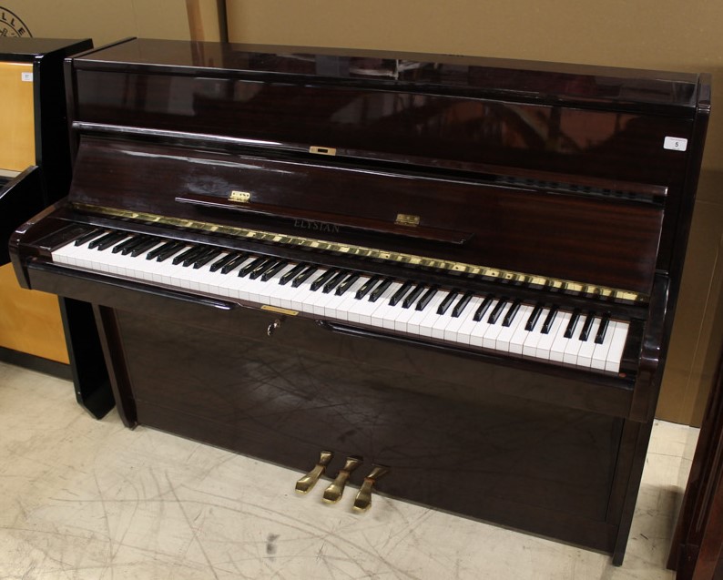 Elysian A recent upright piano in a modern style bright mahogany case;