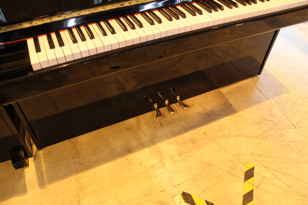 Niemeyer A recent upright piano in a modern style bright ebonised case; together with a stool. - Image 5 of 6