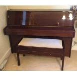 Kemble (c1998) A Cambridge Model upright piano in a bright mahogany case;