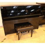 Kawai (c2007) A Model K-15 upright piano in a bright ebonised case; together with a stool.