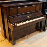 Bechstein (c1900) An upright piano in a rosewood case.