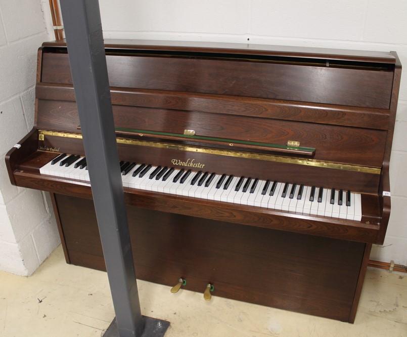 Woodchester A recent 112cm upright piano in a modern style satin mahogany case.