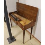 Morley clavichord A Morley clavichord in a walnut case on turned and fluted legs.