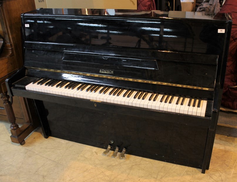 Ronisch A recent 113cm upright piano in a bright ebonised case.