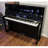 Hoffmann (c2015) A Model Vision 120 upright piano in a traditional bright ebonised case;