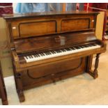 Steinway (c1900) An upright piano in a rosewood case.