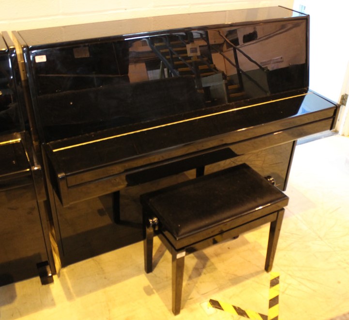 Niemeyer A recent upright piano in a modern style bright ebonised case; together with a stool. - Image 2 of 6