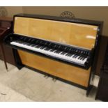 Schimmel (c1957) An upright piano in a modern style maple and ebonised trimmed case.