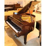 Blüthner (c1984) A 5ft 1in Model 11 grand piano in a bright mahogany case on square tapered legs.