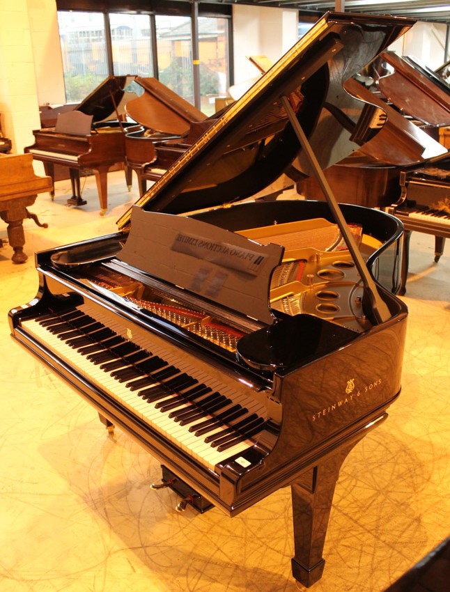 Steinway (c1906) A 5ft 10in Model O grand piano in a bright ebonised case on square tapered legs.