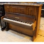 Bechstein (c1879) An upright piano in a figured walnut case.