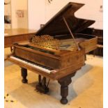 Steinway (c1880) A 9ft concert grand piano in a walnut case on sabre legs.