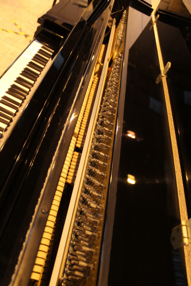 Niemeyer A recent upright piano in a modern style bright ebonised case; together with a stool. - Image 6 of 6