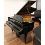 Steinway (c1971) A 6ft 11in Model B grand piano in a bright ebonised case on square tapered legs;